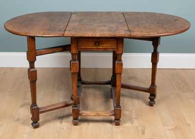 Lot 632 - A Scandinavian pine drop-leaf table