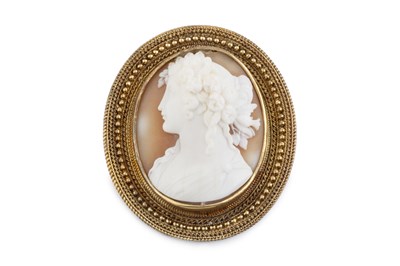 Lot 33 - A Victorian oval shell cameo brooch, carved to...