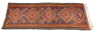 Lot 1306 - A 20th century hand-woven Anatolian style Kilim runner