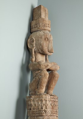 Lot 1386 - A carved wooden garden ornament in the form of a totem pole
