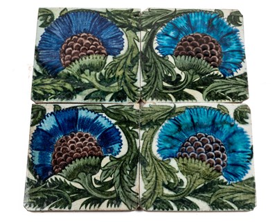 Lot 640 - A set of four William De Morgan BBB pattern tiles