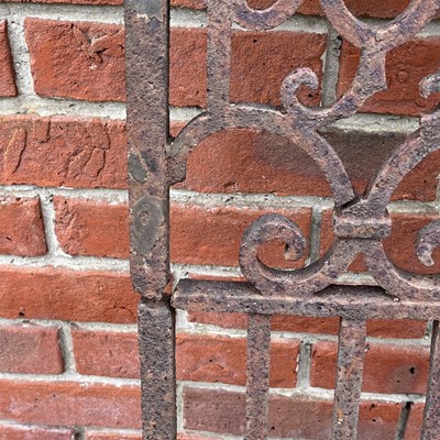 Lot 1409 - A pair of Victorian cast iron ornamental panels