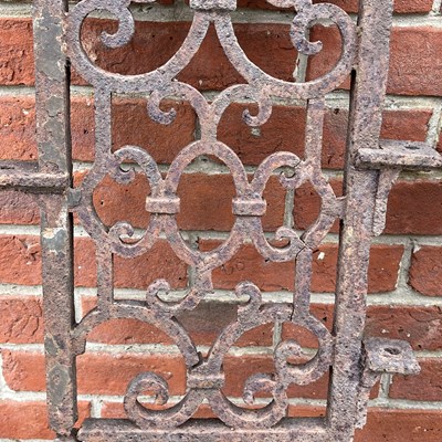 Lot 1409 - A pair of Victorian cast iron ornamental panels
