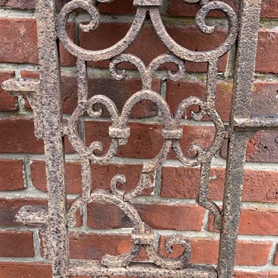 Lot 1409 - A pair of Victorian cast iron ornamental panels