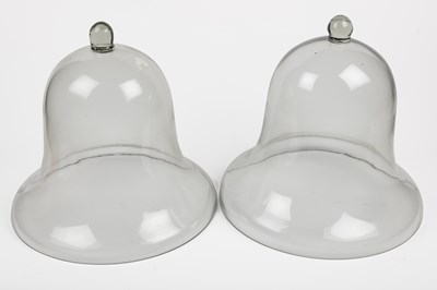 Lot 1390 - A pair of glass cloches