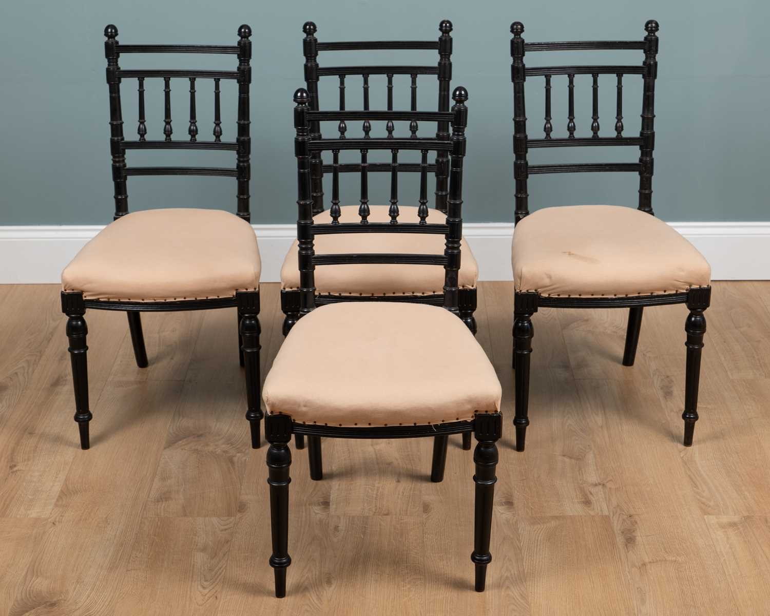 Lot 74 - A set of four Victorian ebonised Arts & Crafts movement side chairs