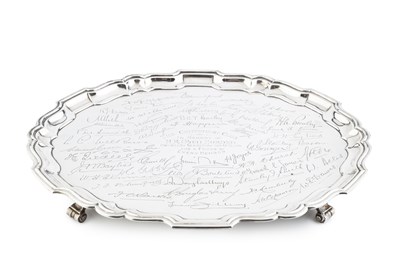 Lot 778 - A George VI silver oval salver, with shaped...