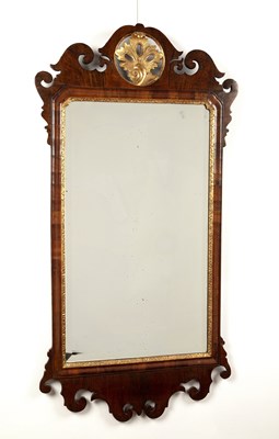 Lot 69 - Bevelled and fretted mirror George III, the...