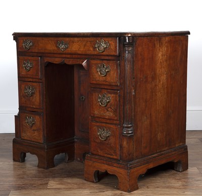 Lot 86 - Walnut kneehole desk Queen Anne, crossbanded...
