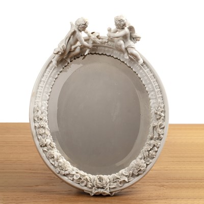 Lot 71 - White porcelain oval mirror bevelled glass,...