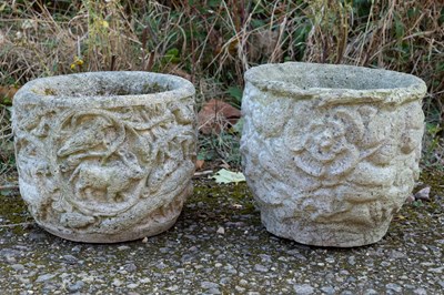 Lot 1349 - A group of three cast reconstituted stone garden planters