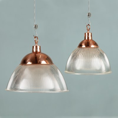 Lot 1102 - A pair of contemporary copper and glass industrial style lamps