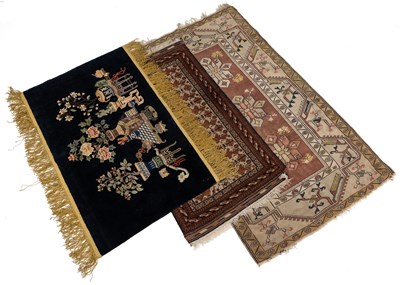 Lot 1271 - A collection of three rugs