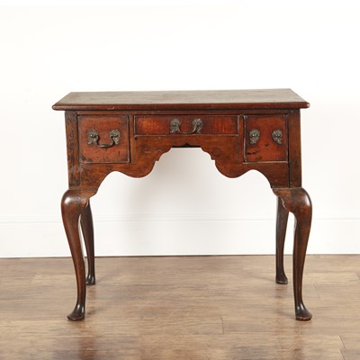 Lot 55 - Mahogany lowboy George III, one long and two...