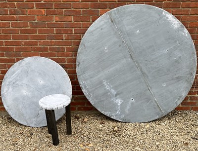 Lot 1374 - Two circular zinc-covered table tops