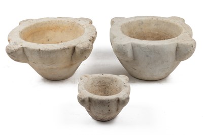 Lot 1445 - A group of three antique marble mortars