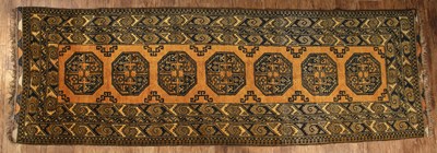 Lot 30 - Afghan runner honey ground, the central...