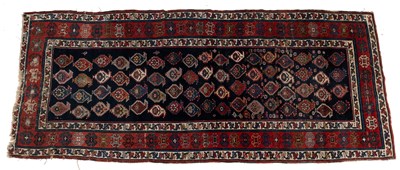 Lot 1290 - An early 20th century Caucasian hand-woven wide runner