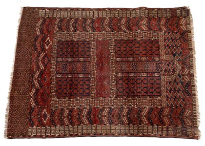 Lot 1313 - An early 20th century woollen hand-woven Baluchi prayer mat