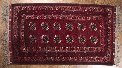 Lot 55A - Kayam wool rug Afghan, maroon ground, the...