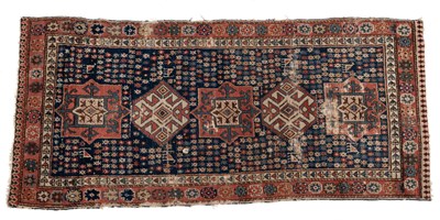 Lot 1298 - An early 20th-century woollen hand-woven Caucasian rug