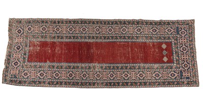 Lot 1310 - An early 20th-century woollen hand-woven Caucasian runner