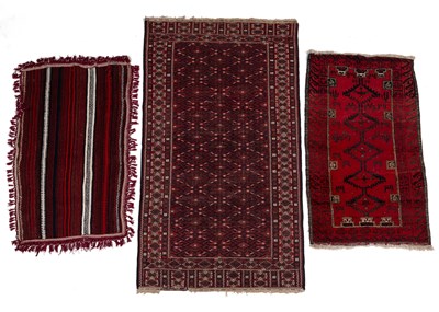 Lot 1261 - A group of three rugs