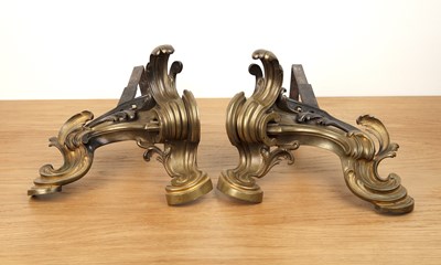 Lot 27 - Pair of brass chenets Rococo style, of...