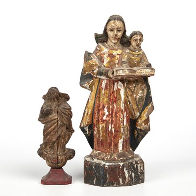 Lot 579 - Two South American wood-carved statuettes