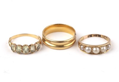 Lot 240 - Three gold rings comprising an 18ct gold band,...