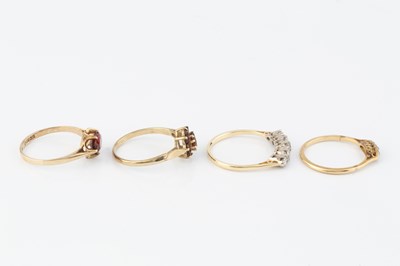 Lot 236 - A diamond five stone ring, the slightly...