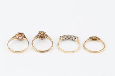 Lot 236 - A diamond five stone ring, the slightly...