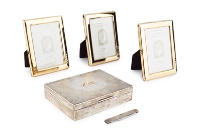 Lot 786 - Three silver-gilt mounted photograph frames,...