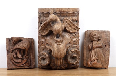 Lot 449 - Three carved wood mounts Indian, including a...