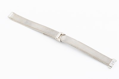 Lot 258 - A diamond set jarretière bracelet, of textured...
