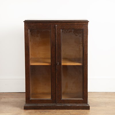 Lot 18 - Oak glazed cupboard early 20th Century, on a...