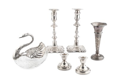 Lot 790 - A pair of late Victorian silver candlesticks,...