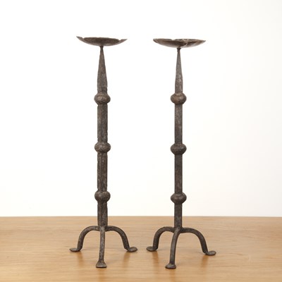 Lot 110 - Pair of pricket candlesticks iron, tripod base,...