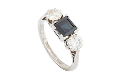 Lot 172 - A sapphire and diamond three stone ring, the...