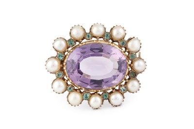 Lot 104 - A vari gem-set cluster brooch, centred with an...