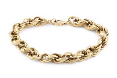 Lot 67 - A fancy-link bracelet, of part textured...