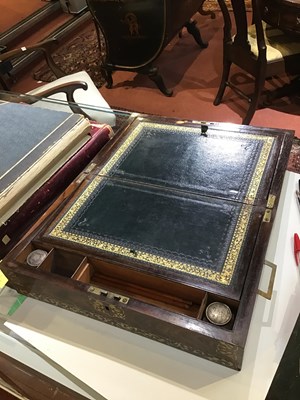 Lot 106 - A Regency rosewood and brass inlaid writing...