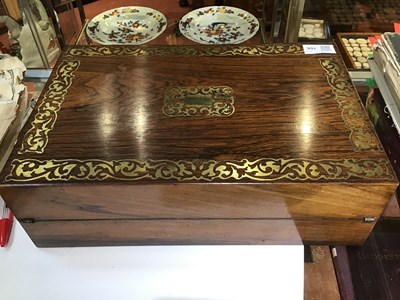 Lot 106 - A Regency rosewood and brass inlaid writing...
