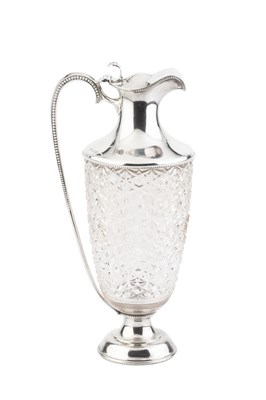 Lot A George V silver and cut glass claret jug, of...