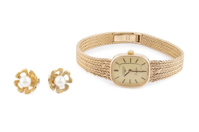 Lot 353 - A lady's 9ct gold bracelet watch by Longines,...