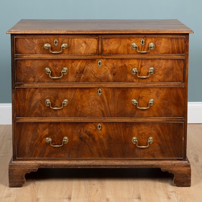 Lot 320 - A George III walnut chest of drawers