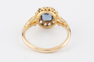Lot 274 - An Edwardian blue stone and diamond cluster...