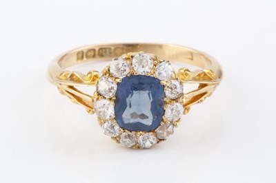 Lot 274 - An Edwardian blue stone and diamond cluster...