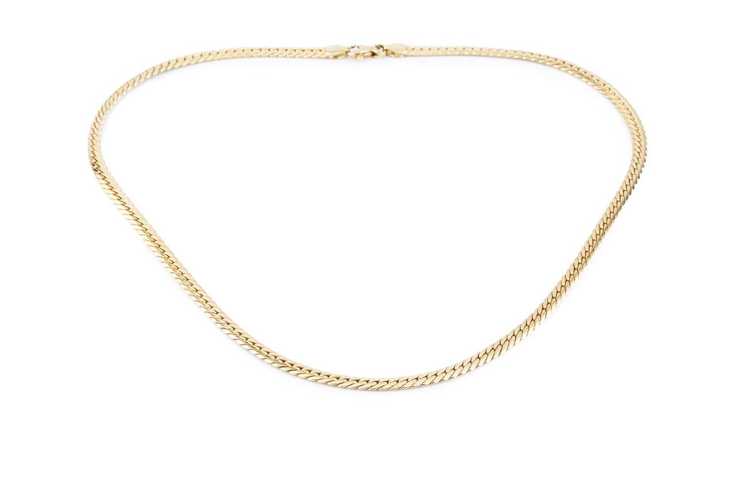 Lot 197 - A fancy-link necklace, the clasp stamped '750',...