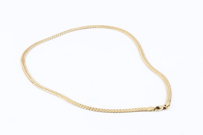 Lot 197 - A fancy-link necklace, the clasp stamped '750',...